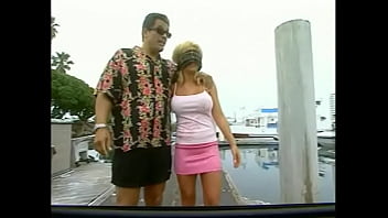 Lustful blonde fucks with an excited man on a yacht in a dog's pose and deeply swallows his penis filling her mouth with sperm