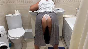 Milf bent down and her ass became visible, in which the penis entered well