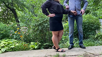 Hot MILF in short skirt helps man give golden shower