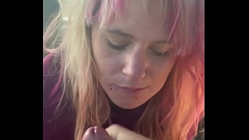 Pretty hooker gets on her knees to suck dick in the backseat of a car and takes a load in her whore mouth