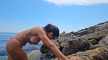 A fisherman on the rocks wants to give me his fish. Part 1