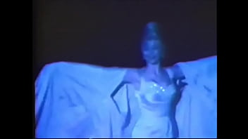 A gorgeous beauty in an evening dress will show you a beautiful striptease before passionate sex