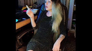 Adult stepdaughter smokes a cigarette