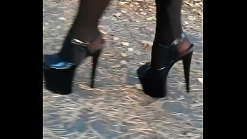 Lady L walking xtreme black high heels.