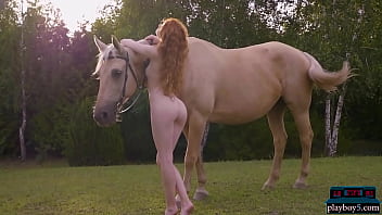 Gorgeous hot redhead MILF Heidi Romanova outdoor solo for Playboy