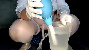 Enema for the nurse's vagina over the patient's face