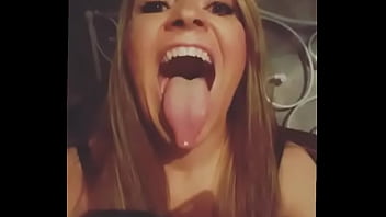 Horny milf shows long tongue and throat
