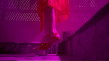 Artemisia Love wearing sexy high heels and smoking a cigarette outdoor