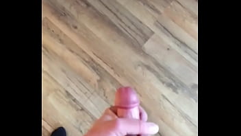 Jerking my big hard throbbing cock and shooting a massive cumshot on my hardwood floor cumshot is at end of video enjoy!